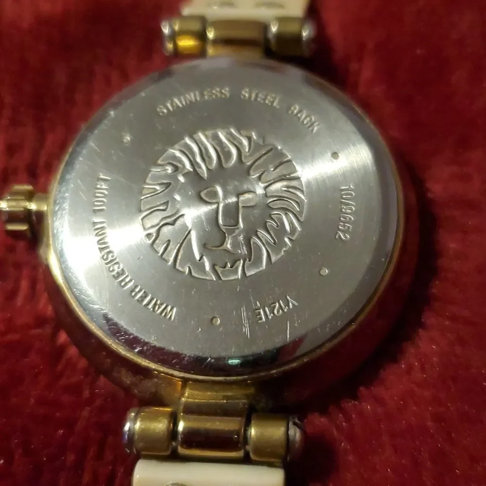 Anne Klein Women's AK-1408CRCR‎ Gold Plastic Analog Quartz Bangle Style Watch